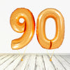 Ballon 90 chiffres dorés XL (rempli d'hélium) 